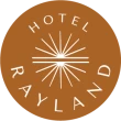 This image shows a brown circular logo with “Hotel Rayland” written around a stylized sunburst design.